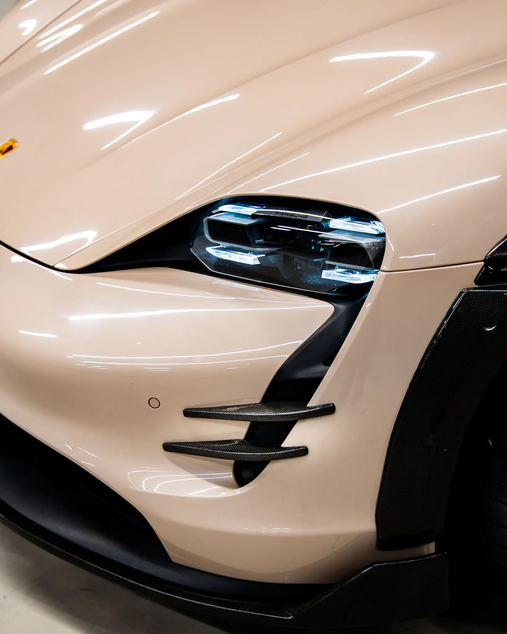Carbon intake blades fitted to a Porsche Taycan front bumper