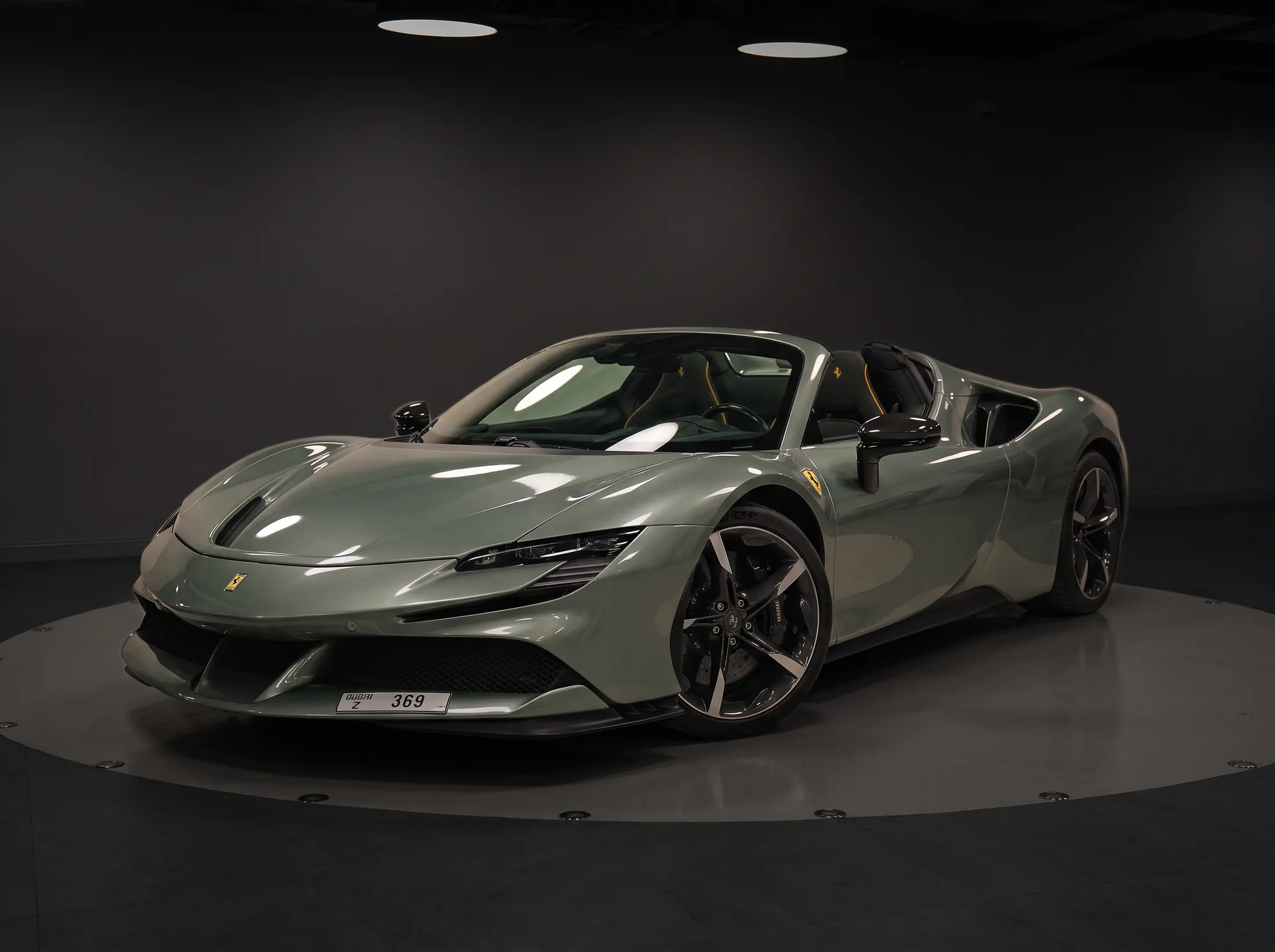 Ferrari SF90 in sage green paint protection, studio turntable