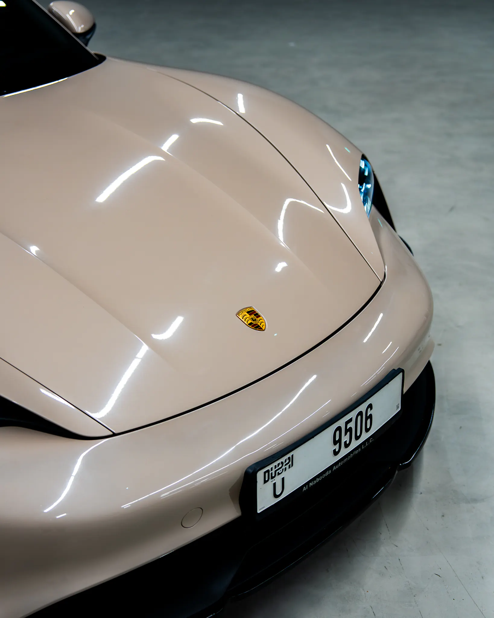 Porsche Taycan bonnet and crest detail