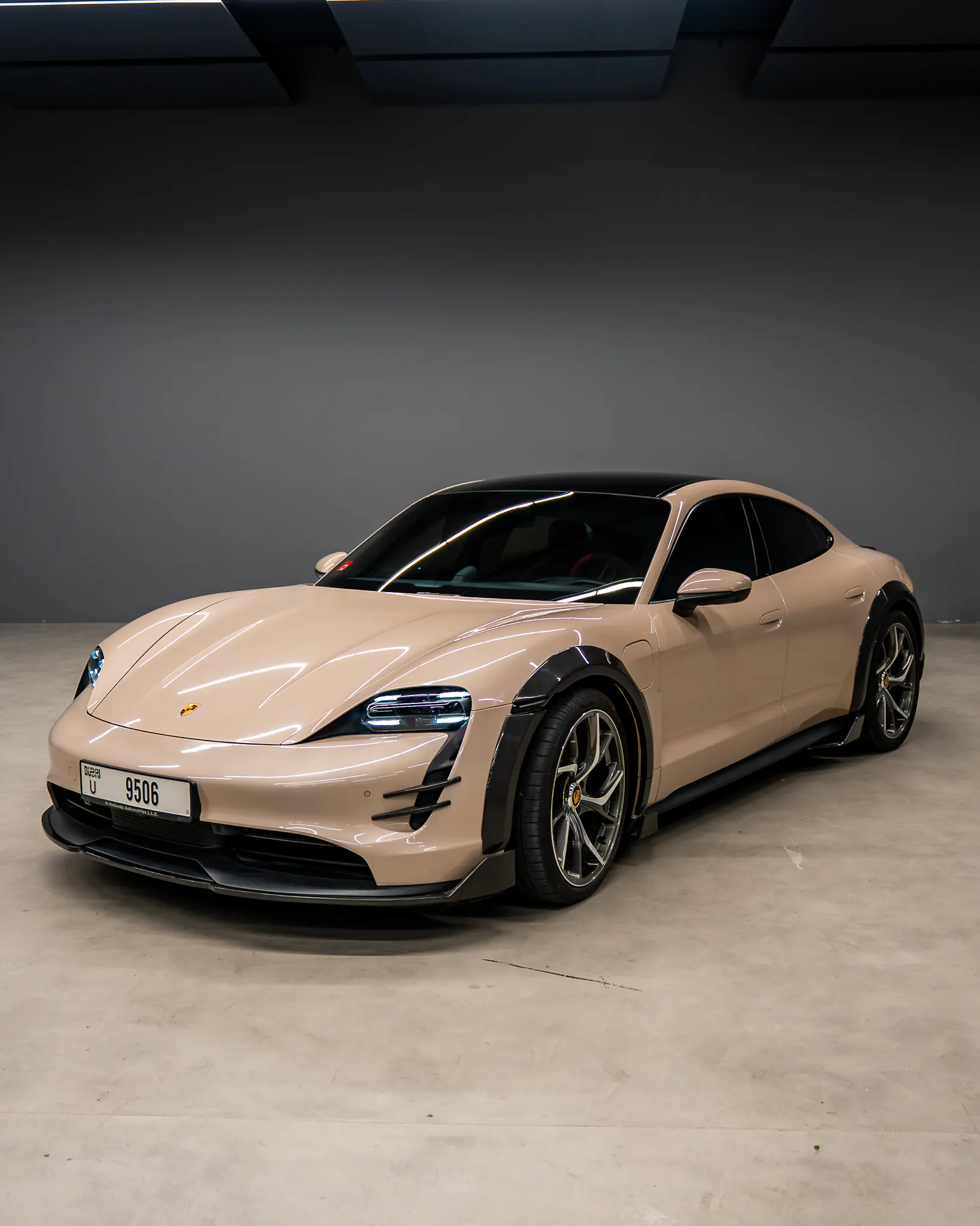 Porsche Taycan, front three-quarter, carbon wide arches